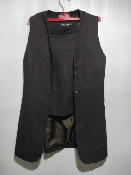 Traje con falda y chaqueta sin mangas Cortefiel talla 40