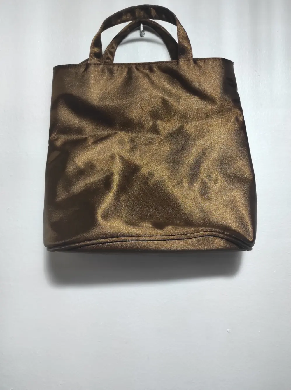 Bolso de mano Revlon, foto 2