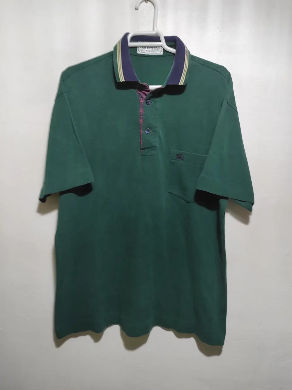 Polo manga corta Burberrys talla 4 equivale a una M