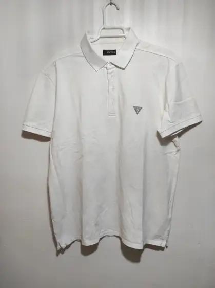 Polo manga corta Guess talla L sirve para M ver medidas
