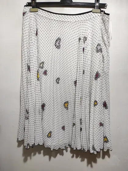 Falda plisada violeta by mango talla L ver medidas