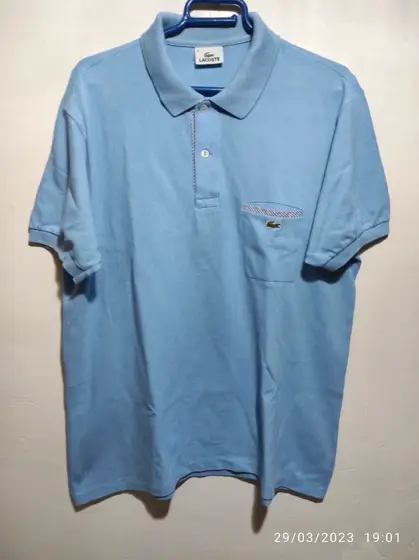 Polo manga corta Lacoste talla 5 equivale a una L ver medidas