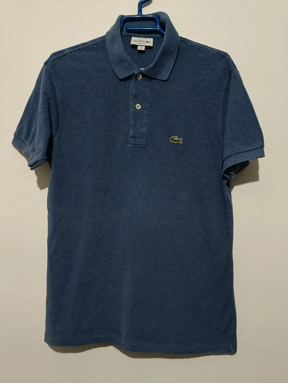 Polo manga corta Lacoste talla 3 equivale a una S