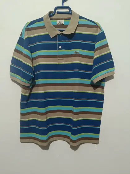 Polo a rayas Lacoste talla 6 equivale a una XL ver medidas