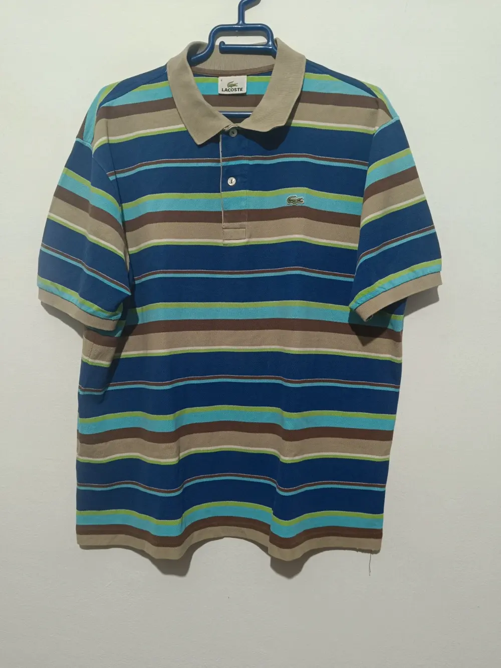 Polo a rayas Lacoste talla 6 equivale a una XL ver medidas