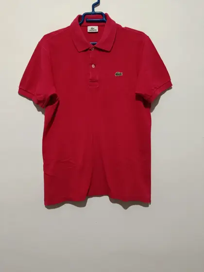 Polo Fucsia Lacoste talla 4 equivale a una M ver medidas
