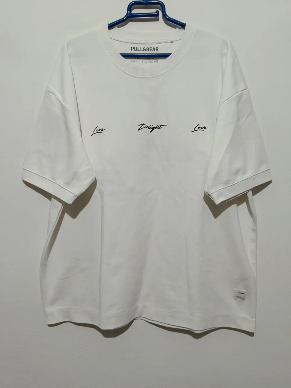 Camiseta gráfica Pull & Bear talla L ver medidas