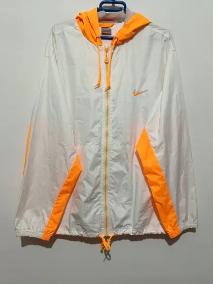 Chaqueta naranja y blanca cortavientos vintage Nike talla XL