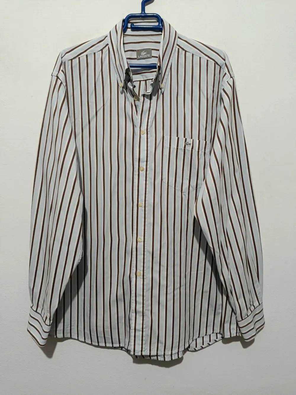 Camisa a rayas manga larga Lacoste talla 44 equivale a una XL ver medidas