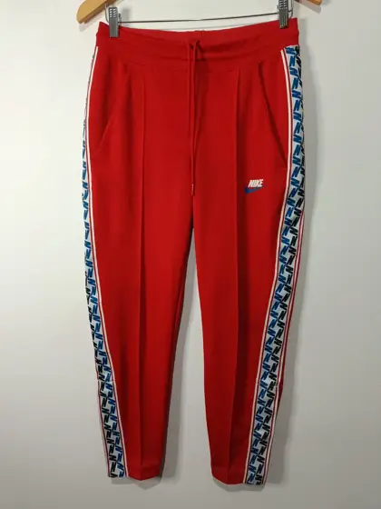 Pantalón retro Y2K Nike Taped Poly rojo talla S unisex