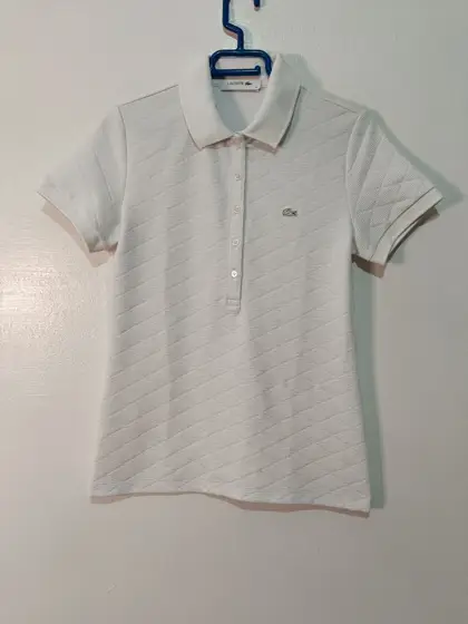 Polo Lacoste Mujer Textura Rombos Blanco talla 36 S ver medidas