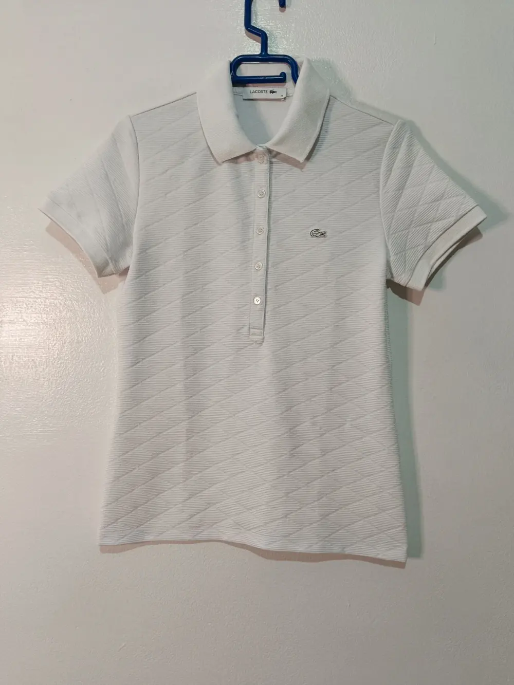 Polo Lacoste Mujer Textura Rombos Blanco talla 36 S ver medidas