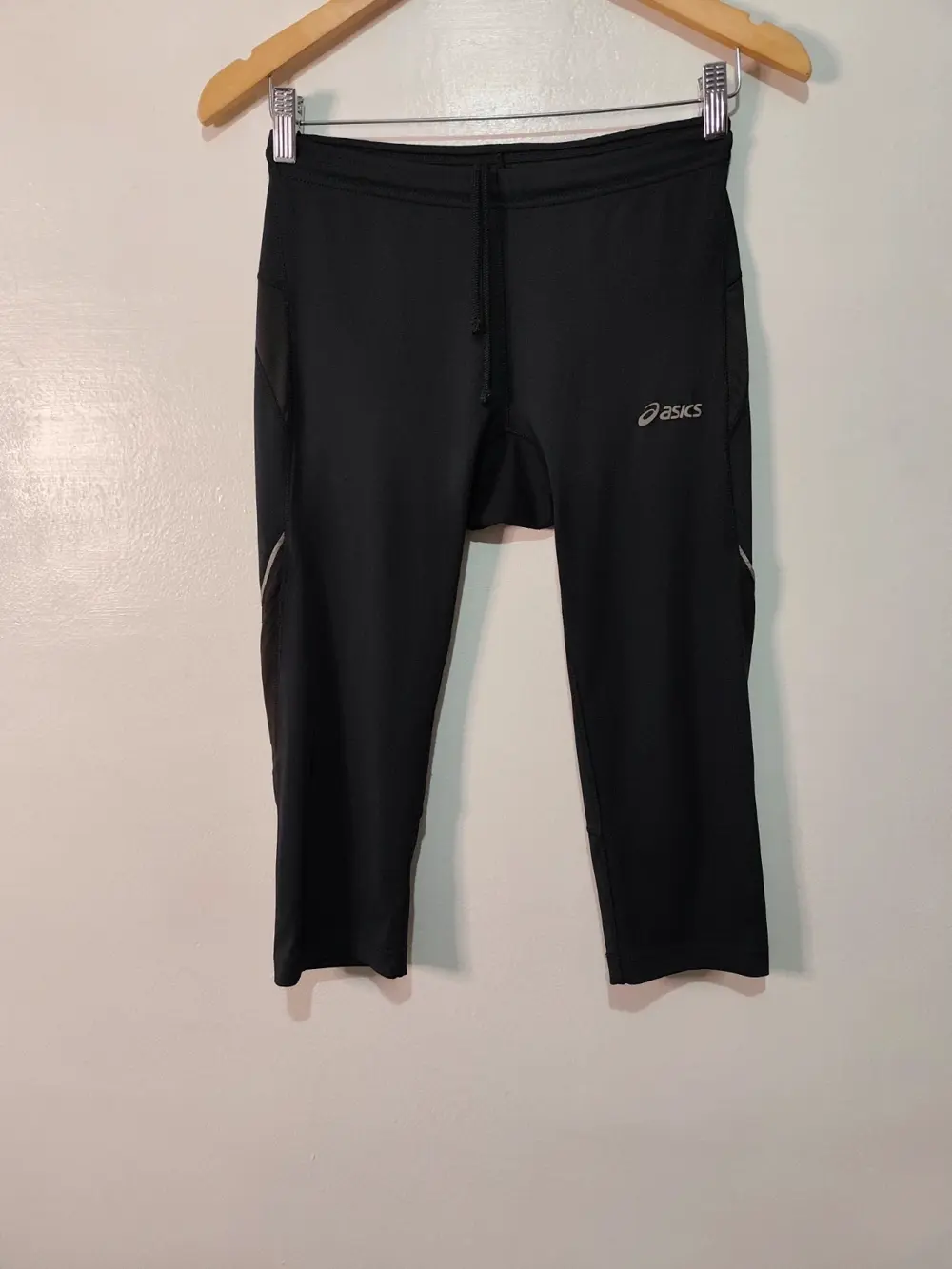 Mallas pirata asics running con bolsillo trasero y tobillo reflectante talla m
